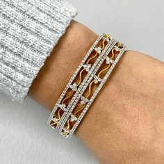 The Sheena Bangles draw on Indian heritage with their sweet flowery details and gentle curves. They are a sweet and elegant pair. Total Diamond Weight: 10.59 ct No. of Diamonds: 552 Diamond Color: G - HDiamond Clarity: VS - SI (Very Slightly Included - Slightly Included) Metal: 18K Yellow Gold Metal Wt: 35.48 gms Setting: Prong Set Inner Diameter: 2.5 Inches (6.35 cm) Diamond Bangles, Diamond Free, Indian Heritage, Diamond Bangle, Diamond Color, Prong Setting, Colored Diamonds, Natural Diamonds, Gold Metal