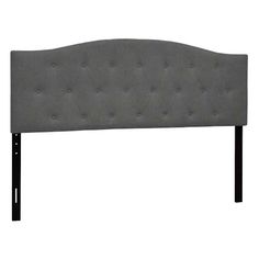 a gray headboard with black legs and buttons