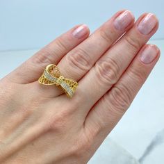 18k Gold Filled Adjustable Ring, 3D Mesh Ribbon Bow Ring featuring Micro Cubic Zirconia Adjustable Ring, Cutout Bow Ring, Wholesale Jewelry. Ring Size: Thickness: 2mmBow Size: Length: 22mm | Width: 12mm Brilliant Cut Cubic Zirconia Butterfly Ring As Gift, Cubic Zirconia Butterfly Ring As Gift, Gold Cubic Zirconia Crystal Ring As Gift, Gold Cubic Zirconia Butterfly Ring For Formal Occasions, Formal Gold Cubic Zirconia Butterfly Ring, Dazzling Pave Set Crystal Ring As Gift, Formal Gold Butterfly Ring With Cubic Zirconia, Formal Yellow Gold Butterfly Ring With Cubic Zirconia, Gold Cubic Zirconia Butterfly Ring For Gift