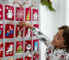 Quilted Kids Advent Calendar | Pottery Barn Kids Sewn Advent Calendar, Baby Advent Calendar, Quilted Advent Calendar, Kids Advent Calendar, Kids Advent, Advent Calendar Pattern, Cool Advent Calendars, Felt Advent Calendar, Advent Calendar Fillers