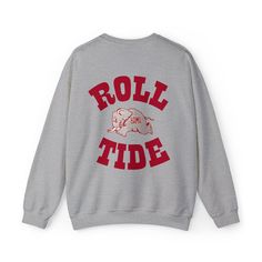 It's football season in our house which means it's time to break out the crimson. Roll tide! Ideal for any situation, a unisex heavy blend crewneck sweatshirt is pure comfort. These garments are made from polyester and cotton. This combination helps designs come out looking fresh and beautiful. The collar is ribbed knit, so it retains its shape even after washing. There are no itchy side seams on these sweaters.  .: Made with a medium-heavy fabric blend of 50% cotton and 50% polyester (8.0 oz/yd² (271.25 g/m this sweatshirt feels cozy and is the perfect choice for those colder months. .: The classic fit along with the crew neckline deliver a comfy wearing experience with a clean-cut style. Meanwhile, the double-needle stitching at the shoulder, armhole, neck, waistband, and cuff seams add Roll Tide Shirts Vinyl, Roll Tide Aesthetic, Vintage Football Crewneck, Roll Down Tide Sweater, Alabama Sweatshirt, Football Fan Shirts, Emoji Shirt, Vintage Crewneck Sweatshirt, Football Sweater