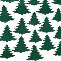 green christmas trees are arranged in rows against a white background