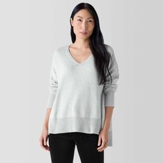 Cotton meets cashmere. A cozy V-neck top with a stepped hem, in a light and lofty blend of organic cotton and recycled cashmere. Fine Knit Cashmere V-neck Tops, V-neck Cashmere Sweater For Loungewear, Recycled Cashmere, Light Knit, Slim Fit Pants, Slim Pants, Work Casual, Eileen Fisher, V Neck Tops