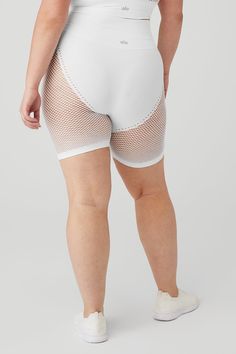 These mesh shorts! Our Seamless High-Waist Limitless Open Air Short is a total breath of fresh air. Seamless, sheer mesh stretches into a biker when they’re on, to stun in practice or on the street. Pair with the Seamless Open Air bra for a bold, head-to-toe look. Seamless performance fabric & sheer, airy mesh On-trend high waist Designed & uniquely fit to flatter every size Wear-tested by our in-house team for the perfect fit Alo Yoga® | Seamless High-Waist Limitless Open Air Short in White, Si Air Bra, Mesh Shorts, Breath Of Fresh Air, Alo Yoga, Performance Fabric, Open Air, Fresh Air, White Shorts, High Waist