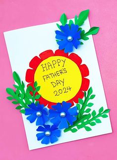 a father's day card with paper flowers on it and the words happy fathers day