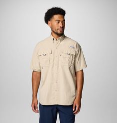 Featuring angler-friendly details and lightweight nylon fabric in a roomy Relaxed Fit, this fishing shirt dries fast, keeps you cool, and blocks sun so you can stay out there longer. Summer Outdoor Khaki Short Sleeve Shirt, Khaki Short Sleeve Shirt For Summer Outdoor, Summer Khaki Short Sleeve Shirt For Outdoor, Outdoor Khaki Camp Shirt With Pockets, Khaki Camp Shirt With Pockets For Outdoor, Casual Durable Shirt For Outdoor, Button Down Short Sleeve, Nylon Fabric, Columbia Sportswear