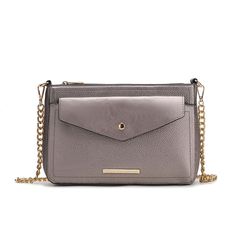 Our Maribel 3-in-1 Crossbody bag is the most chic, compact crossbody to keep you organized on the go. Designed with gold-tone hardware and crafted from high-quality vegan pebbled leather, it can be worn in three different ways. Wear the crossbody bag on its own for a chic take on minimalism. Unzip it to reveal a fully lined interior with a wall-zippered pocket and a slip pocket. When your mood strikes, attach the envelope clutch to the front slip pocket. For days you want to travel light, use th Gold Rectangular Shoulder Bag With Cell Phone Pocket, Gold Flap Bag With Metal Hardware For Travel, Versatile Silver Crossbody Shoulder Bag, Gold Evening Bag With Cell Phone Pocket, Gold Flap Bag With Metal Hardware For Everyday Use, Gold Crossbody Flap Bag With Chain Strap, Modern Gold Shoulder Bag With Mobile Phone Holder, Silver Crossbody Bag With Gold-tone Hardware, Modern Gold Shoulder Bag For Mobile Phone