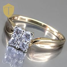 This modern 10K gold ring features four sparkling diamonds, each approximately 0.15 carats, offering a combined brilliance that captures the light beautifully. Weighing 3.5g, this size 9.25 ring provides a balanced design with a finger coverage of 7.3mm and a rise of 8.1mm, making it both elegant and eye-catching. In great condition, this stylish piece adds a contemporary touch to any collection with its clean lines and radiant diamonds. Karat: 10K Weight: 3.5g Size: 9.25 Approximate measurement: coverage: 7.3 / Rise: 8.1 Stone(Approx. Size):  Diamond 4 (0.15ctw each) Markings: 10k  Condition: Great Approx Era: Modern DELIVERY Our shipping and handling is always fast & free unless otherwise stated. Once an order is placed and payment is received, all items are shipped within one business d Balanced Design, 10k Gold Ring, Ladies Ring, Radiant Diamond, Sparkle Diamonds, 10k Gold, Rings Statement, Clean Lines, Gold Ring