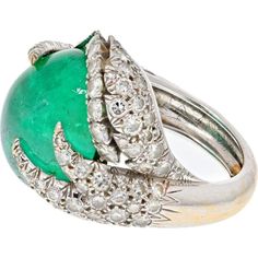 Cherish the elegance of artisanal craftsmanship and the innovation of modern design with the David Webb Platinum Cabochon Cut Green Emerald and Diamond Ring. This breathtaking ring is a celebration of opulence and sophistication, showcasing an exquisite oval cabochon emerald weighing approximately 26 carats. The emerald's deep green hue is nothing short of mesmerizing, capturing the essence of natural beauty.Surrounding the captivating emerald are dazzling diamonds, totaling approximately 6 carats, which add a brilliant sparkle and further elevate the ring's allure. Crafted in platinum, this ring not only exudes luxury but also reflects enduring quality and refinement. Its substantial size and striking presence make it a true statement piece, perfect for those special occasions where you w Emerald And Diamond Ring, David Webb, Yellow Rings, Yellow Jewelry, Diamond Birthstone, The David, Rich Green, Platinum Metal, Emerald Jewelry