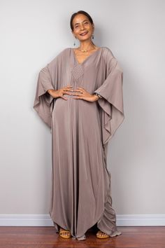 Kaftan, Taupe Loose fit evening caftan dress, Champagne party dress, Beige Kimono dress, Light brown women's Maxi Dress, Oversized frock dress, maternity dress, gift for mom  Elegant Collection --> Produced by NUICHAN & Co   PRODUCT SIZE : Free Size * Chest : free up to 32 - 58" * Waist : free up to 58" * Hips : free up to 56"  * Length : 56" from shoulder to hem (measured when laying flat) MATERIAL  * Venetia * No lining MODEL :  * Model chest : 32", waist : 24" hips : 35"  * Combined Height is 5"6 > I'm 5"2 (158cm) and I'm wearing 4" heels in the pictures * Accessories excluded  POLICY : https://www.etsy.com/shop/Nuichan/policy  IMPORTANT NOTE  *Please note that colors shown on your monitor may vary from the actual colour of the fabric. If you have the slightest doubt about the actual co Champagne Party Dress, Beige Kimono, Taupe Maxi Dress, Dress Gala, Long Kaftan Dress, Dress Loose Fit, Loose Fit Dress, Taupe Dress, Gala Dress