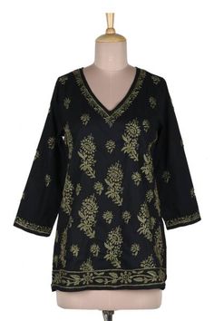 India's Shalabh designs this 100% cotton tunic featuring a V neck long sleeves and lateral slits for comfort and freedom of movement. Traditional chikankari hand embroidery in olive green is used to create intricate flowers buds and leaves across the field of jet black fabric to create this wardrobe staple which pairs with just about anything. Fall Chikankari Embroidery Kurta, Fall Floral Embroidered Straight Kurta, Festive Fall Kurta With Chikankari Embroidery, Chikankari Embroidery Kurta For Festive Occasions In Fall, Festive Kurta With Chikankari Embroidery For Fall, Black Long Sleeve Kurta With Block Print, Cotton Tunic With Intricate Embroidery And Long Sleeves, Cotton Long Sleeve Tunic With Intricate Embroidery, Long Sleeve Cotton Tunic With Intricate Embroidery