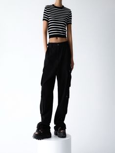 Chic and trendy oversized wide leg cargo pants in 100% cotton. Three pockets down outside leg with snap button closure detail. Model is in MINUSEY S. ✔️ Free worldwide express shipping over $100✔️ Loved by 6,500+ customers✔️ Limited edition collections, maximum styleStay ahead of the trend with can’t-find-anywhere-else staples. Your closet will thank you 💕 * MINUSEY S = EU 34, US 2* MINUSEY M = EU 36, US 4* 100% Cotton* Dry clean* Made in Korea - Model Height: 169cm/5'6" (US2, EU34) Black Baggy Wide-leg Cargo Jeans, Streetwear Wide Leg Parachute Pants With Flap Pockets, Wide Leg Parachute Pants With Flap Pockets For Streetwear, Black Wide Leg Pants With Cargo Pockets For Streetwear, Black Wide Leg Cargo Pants For Streetwear, High Waist Cargo Pants With Flap Pockets For Streetwear, Wide Leg Cargo Pants With Flap Pockets For Streetwear, Trendy Cotton Wide Leg Cargo Pants, Trendy Wide Leg Cotton Cargo Pants