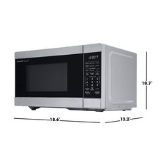 a microwave oven with measurements for the size