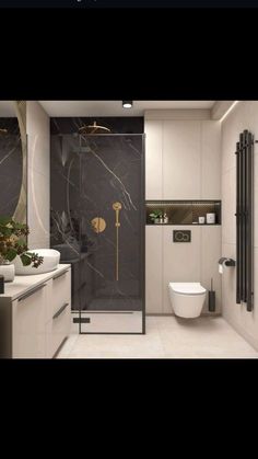 a bathroom with black and white marble walls