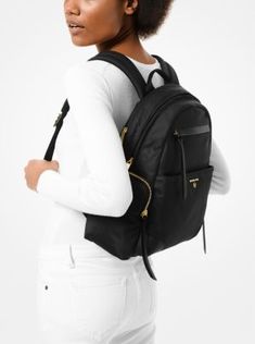 Our Prescott backpack is rendered in lightweight yet durable nylon gabardine making it ideal for daily use. Contrast leather trim and our updated logo charm add a luxe touch while exterior pockets and a front zipped compartment provide ample space for all the essentials. The padded straps and mesh back ensure comfort no matter how heavy your haul. Designer Nylon Backpack For Everyday, Designer Nylon Backpack For Travel, Luxury Nylon Backpack With Leather Trim, Travel Backpack With Leather Trim And Nylon Material, Luxury Nylon Backpack With Zipper Closure, Tumi Backpack, Beautiful Backpacks, Day Backpacks, Backpack Reviews