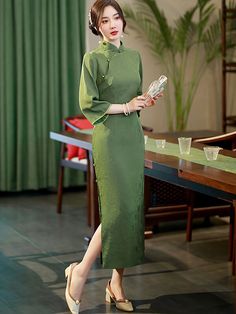 vintage-cheongsam-dress-loose-qipao (8) Long Cheongsam For Tea Ceremony, Elegant Ao Dai With Stand Collar For Spring, Elegant Spring Ao Dai With Stand Collar, Elegant Green Cheongsam With Stand Collar, Green Elegant Cheongsam With Stand Collar, Long Dresses For Tea Ceremony, Formal Stand Collar Ao Dai, Elegant Spring Cheongsam With Stand Collar, Spring Elegant Cheongsam With Stand Collar