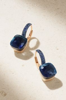 Founded in Milan in 1967, Pomellato embodies the elegant and unconventional beauty of its hometown. These earrings have been handcrafted in-house from 18-karat rose and white gold and set with deep blue topaz, lapis lazuli and sapphires. Their small size makes them perfect for stacking. Luxury Sapphire Yellow Gold Earrings, Luxury Jewelry With Pave Setting For Party, Timeless Evening Earrings With 17 Jewels, Designer Gemstone Jewelry For Evening, Luxury Pave Setting Earrings For Formal Events, Luxury Pave Set Earrings For Formal Occasions, Designer Formal Gemstone Earrings, Designer Gemstone Earrings For Formal Occasions, Luxury Sapphire Drop Earrings