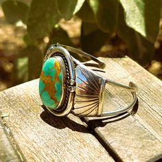 Native Green Oval Turquoise Cuff Bracelet in Sterling Silver | Jewelsmith Southwestern Style Oval Jewelry With Polished Finish, Southwestern Style Turquoise Oval Ring With Polished Finish, Southwestern Style Oval Turquoise Ring With Polished Finish, Southwestern Oval Jewelry With Polished Finish, Bohemian Cuff Bracelet With Polished Finish, Oval Cuff Bracelet With Polished Finish, Oval Turquoise Cuff Bracelet As Gift, Unique Oval Turquoise Bracelets, Bohemian Oval Gemstone Cuff Bracelet