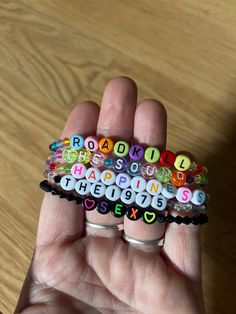 This 5 pack of stretchy bracelets is great for giving out at concerts or stacking for yourself! They are fully customizable from they types of letter beads to the colors of bicone beads as long as the word or phrase fits within 26 characters (the longer the phrase the fewer colored beads can be added). This listing is strictly for The 1975 (I will not do anything relating to TS). The 1975 Friendship Bracelet, The 1975 Bracelet, Trendy Stretch Bracelet With Letter Print Beads, Trendy Stretch Bracelet With Letter Print And Round Beads, Trendy Stretch Bracelet With Letter Print, The 1975 Concert Outfit, Concert Bracelets, The 1975 Concert, The 1975 Me