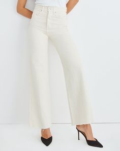 Updated in fresh ecru, the Taylor is a classic high-rise and wide-leg style in non-stretch denim. Flattering and always on-trend, this wear-forever jean also features a raw hem for a fashion-forward finish. Pair with everything from tonal silk blouses to plain white tees for a chic and easy look. Classic High Rise Wide Leg Pants, Elegant Wide Leg Spring Jeans, Elegant Wide-leg Spring Jeans, Elegant Wide-leg Jeans For Spring, Elegant Spring Wide-leg Jeans, Classic Cream Jeans For Workwear, Classic Beige Wide Leg Jeans, Chic Wide-leg Jeans, Chic Beige High-waist Flare Jeans