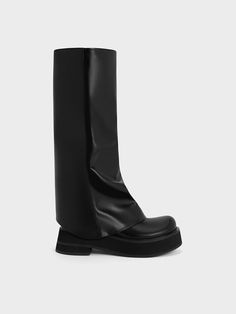 The leg-warmer trend is having a moment in fashion right now - and these Cove knee-high boots are certainly a pair that aces that trend with their all-in-one design. Featuring a baggy-like design coupled with the soft cocooning contours of the platform soles, these shoes will add a distinct aesthetic to your overall look, that is almost reminiscent of the Harajuku punk pop fashion. Look a little closer, and you will notice ruched folds that make these boots extra special. Platform Boots Knee High, Harajuku Punk, Leg Warmer, Size Chart For Kids, Faux Leather Heels, Charles Keith, Brunch Outfit, Pink Outfits, Platform Boots