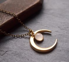 Gold Moonstone Necklace With Moon Charm, Gold Moon Phase Necklace For Wedding, Crescent Moonstone Gold Jewelry, Celestial Gold Necklace With Moonstone, Celestial Gold Moonstone Necklace, Gold Moonstone Jewelry With Moon Phase, Gold Moonstone Necklace As Gift, Gold Moonstone Necklace For Gift, Gold Moon Necklace For Wedding