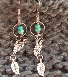 Turquoise Bead With Leaf Dangle Charms Within Small Hoop | Etsy Bohemian Hoop Earrings With Dangling Charms, Turquoise Dangle Hoop Earrings Nickel Free, Turquoise Dangle Hoop Earrings, Nickel-free Turquoise Dangle Hoop Earrings, Color Turquesa, Ear Clips, Diy Wire Jewelry, Leaf Charms, Dangle Charms