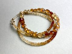 CITRINE GEMSTONE BRACELET IN GOLD FILLED  Gemstone bracelet with faceted Citrine and Gold filled Beads. The length of this bracelet is 17,5cm. If you need another length, please let me know. I send all my Jewelry packaged in a small Cotton Jewelry pouch. Please note that the appearance/coloring of the stones can vary as they are natural stones. MATERIAL faceted Citrine beads 3,5mm Gold filled beads and closing Length 17,5cm (you can write me a message, if you need another length) Cotton Jewelry, Bracelet For Her, Citrine Bracelet, Romantic Gifts For Her, Citrine Beads, Yellow Gemstones, Garnet Bracelet, Hessonite Garnet, Citrine Gemstone