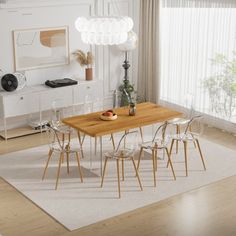 a dining room table and chairs in front of a large window with white drapes