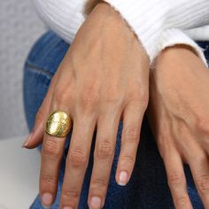 Big chunky boho ring. A unique statement ring inspired by ethnic decorative patterns. A big bold ring, hand sculptured in wax and cast in 925 sterling silver with the lost-wax casting technique. Available also in gold vermeil. Lost-wax casting is one of the most ancient techniques of jewelry making. Top width: 22mm Shank width: 7mm Weight: > 12 gr This ring is available in: * Plain 925 sterling silver * 22K gold vermeil (durable gold plating over 925 sterling silver - for further details see Gold Hammered Open Ring Jewelry, Gold Hammered Ring Jewelry, Gold Brass Dome Ring, Unique Gold Brass Signet Ring, Unique Gold Open Signet Ring, Unique Yellow Gold Wide Band Open Ring, Gold Brass Dome Ring With Open Design, Gold Plated Hammered Ring, Hammered Gold-plated Ring