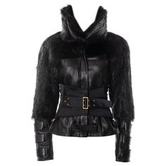 ▪ Gucci black leather and fur jacket ▪ Designed by Tom Ford ▪ Fall-Winter 2003 ▪ Constructed from black leather and beaver fur ▪ Large high-standing collar ▪ Zip and press-stud closures ▪ 3-strap detail on cuffs ▪ Sold with detachable neoprene corset belt ▪ IT 44 - FR 40 - UK 12 - US 8 ▪ Made in Italy All photographs in this listing EXCLUDING any reference or runway imagery needs the credit of the copyright owner if you want to perform certain acts, such as copying the images or sharing them on Fur Corset, Leather And Fur Jacket, Gucci By Tom Ford, Tom Ford Gucci, Tom Ford Leather, Dream Wishlist, Gucci Jacket, Ford Black, Fur Leather Jacket