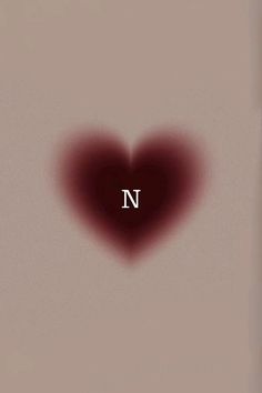 a heart shaped object with the letter n in it