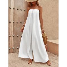 -Item Id 15324044 -Color: White -Style: Boho -Pattern Type: Plain -Type: Tube -Neckline: Strapless -Details: Tie Back, Shirred -Sleeve Length: Sleeveless -Length: Long -Fit Type: Regular Fit -Waist Line: High Waist -Fabric: Non-Stretch -Material: Fabric -Composition: 100% Viscose -Care Instructions: Machine Wash Or Professional Dry Clean -Body: Unlined -Sheer: No **Open To Offers!!!** **Bundle To Save More** **30% Off Bundles Of 2 Or More Items!!** ***Orders Go Out Within 5-10 Business Days!! Th Chic Vacation Overalls, Chic Overall Bottoms For Vacation, White Wide Leg Jumpsuits And Rompers For Beach, Chic White Strapless Jumpsuit For The Beach, White Wide-leg Jumpsuits For Day Out, Chic White Strapless Wide-leg Jumpsuit, White Wide-leg Strapless Jumpsuit For Spring, White Wide Leg Strapless Jumpsuit For Spring, White Strapless Wide Leg Jumpsuit For Summer