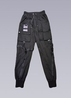 Master the art of aggressive elegance with our unique black combat joggers. Your aura pulsates with stark yet enticing intimidation as you emerge from the city's concrete jungle backdrop. You're not just any passerby – you're an embodiment of progressive style, a tastemaker in your own right. The black sheen of your Tactical Joggers merges seamlessly with the shadows, your every stride underlining your unique aesthetic. This, ladies and gentlemen, is the birth of a new era in street fashion. Beh Jungle Backdrop, Streetwear Joggers, Apocalyptic Clothing, Techwear Pants, Chest Rig, Ladies And Gentlemen, Concrete Jungle, The Brave, Unique Aesthetic