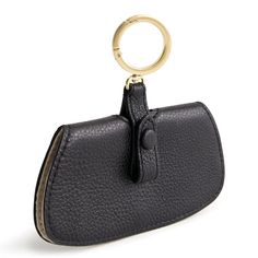 Make a statement wherever you go with our stylish sunglasses bag charm. Designed to add flair to your favorite handbag, backpack, or tote, this charming accessory is a must-have for fashion-forward individuals. Not just a stylish accessory, our bag charm also serves a practical purpose. Simply clip it onto your bag and keep your sunglasses close at hand whenever you need them. No more digging through your bag to find your shades - with our charm, they're always within reach. Vera Bradley Sunglas Rectangular Key Leash Bag Charm For Everyday, Trendy Bag Charm With Key Clip For Everyday Use, Elegant Rectangular Bag Charm, Trendy Bag Charm Keychain For Everyday Use, Trendy Bag Charm For Everyday Use, Trendy Travel Bag Charm Keychain, Leather Bag Charm With Interior Key Chain For Travel, Versatile Everyday Bag With Key Leash, Everyday Rectangular Bag Charm