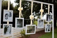 a group of pictures hanging on the side of a fence