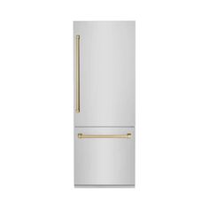 a white refrigerator freezer with gold handles