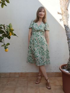 GREEN APPLE loose ramie dress speaks to the effortlessness of summertime. It's crafted from lightweight ramie fabric, has puffed sleeves and the A-line flirty skirt. To define the waist, there is a belt. Perfect to wear with hot weather because ramie is moisture-absorbent, bacterial-resistant and wash-resistant.  IMPORTANT Before placing an order, please read or consult the description of the garment and our policy including manufacturing lead time, shipping time, returns, exchanges, and other r Green Short Sleeve Dress For Brunch, Casual Puff Sleeve Dress For Summer Garden Party, Green Short Sleeve Midi Dress For Brunch, Green Mid-length Dress For Vacation, Green Puff Sleeve Dress For Summer, Green Puff Sleeve Knee-length Dress For Summer, Green Knee-length Puff Sleeve Summer Dress, Green Mid-length Sundress, Green Knee-length Summer Midi Dress