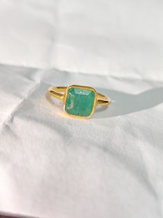 Gemstone Emerald Stone Type Natural Gemstone Weight 2.50 Carat Stamped 925 Sterling Silver Shape Square Rectangular Emerald Fine Jewelry, Fine Emerald Jewelry In Rectangular Shape, Green Rectangular Fine Jewelry, Fine Jewelry Green Rectangular Jewelry, Rectangular Gold Emerald Ring, Gold Rectangular Birthstone Ring, Rectangular Gold Birthstone Ring, Rectangular Emerald Yellow Gold Jewelry, Green Rectangular Rings With Bezel Setting