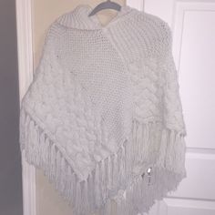 Very Pretty Knit Shawl With Fringe Detail On Bottom In Off White By Coco & Carmen. New Without Tags No Picking, Stains, Rips, Etc. If You Have Any Questions Leave Me A Comment. Happy Shopping! Casual White Knit Poncho, White Knit Poncho, White Knitted One-size Poncho, White Casual Winter Poncho, Casual White Winter Poncho, Hand Knitted White Poncho For Winter, Cozy White Knit Poncho, Cozy White Knitted Poncho, Shawl With Hood