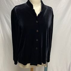 90% Polyester 10% Spandex Black Stretch Tops With Button Closure, Black Stretch Top With Button Closure, Stretch Black Tops With Button Closure, Classic Stretch Tops With Buttons, Black Stretch Blouse With Button Closure, Elegant Black Tops With Snap Buttons, Stretch Button-up Tops With Snap Buttons, Stretch Snap Button-up Tops, Black Tops With Snap Buttons