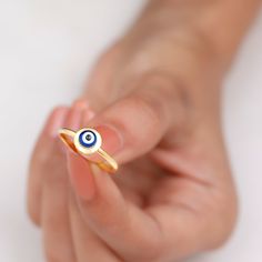 Product Details Turn the blind eye with our Evil Eye Enamel Coated Ring adorned in Solid Gold. Product Information SKU SHP-RINGS122041834 Width 7.5 mm Height 4.4 mm Weight 1.68 gm (Approximate) View More Product Parent Collection Handle evil-eye-jewelry Adjustable Evil Eye Rings, 14k Gold Hallmarked Enamel Ring, Yellow Gold Evil Eye Round Ring, Yellow Gold Evil Eye Rings As Gifts, Yellow Gold Evil Eye Ring, Evil Eye Promise Ring, 14k Gold Evil Eye Ring, Evil Eye Gold Ring, Gold Ring For Women