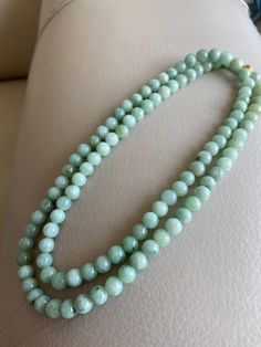 🌈 Jadeite Beaded (7.2mm) Necklace Bracelet, Green Jade, 108 beads 🌷 Untreated Natural Jadeite/ Grade A Jade 🌷 Jade from Myanmar/ Burma 🌷 100% handmade carving 🌷 Bead size : 7.2 mm 🌷 Number of Beads : 108 🌷 Color : Green 🌷 Free shipping from Hong Kong with tracking number provided 🌷 Take approximately 7-28 days to arrive worldwide ❤️ In Chinese Culture: Young people wear jade pendant will have a prosperous life, attracts good luck and friendship Old people wear jade pendant will have a h Green Amazonite Jewelry With 8mm Beads, Amazonite Necklace With 108 Round Beads, Hand-strung Jade Necklaces With Round Beads, Hand-strung Round Jade Bead Necklaces, Jade Beaded Necklaces With 8mm Round Beads, Jade Beaded Necklaces With 8mm Beads, Single Strand Jade Beaded Necklace With Round Beads, Healing Single Strand Round Bead Gemstones, Natural Jade Round Beads