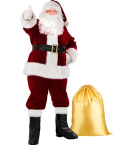 a man dressed as santa claus giving the thumbs up next to a sack of gold foil