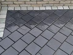 an image of a brick walkway being cleaned