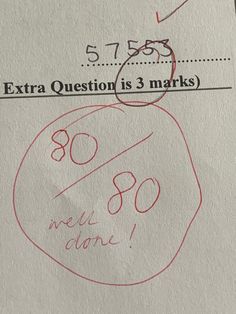 a close up of a piece of paper with a stamp on it that says, extra question is 3 marks