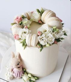 there is a cake decorated with flowers and shells