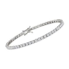 Ross-Simons - 6.50 ct. t.w. Diamond Tennis Bracelet in 14kt White Gold. 8". Classically styled for the ultimate level of sophisticated elegance. This traditional tennis bracelet dazzles with an impressive 6.50 ct. t.w. of round brilliant-cut diamonds, shimmering from end to end in 14kt white gold. An absolute must-have for any fine collection -- you will feel such a glow when you try it on. Double-latch safety. Box clasp, diamond tennis bracelet. Diamond birthstones are the perfect gift for Apri Classic Flexible Cubic Zirconia Diamond Bracelet, Classic Flexible Tennis Bracelet With Round Cut, Classic Flexible Tennis Bracelet, Classic Formal Tennis Bracelet With Cubic Zirconia, Formal Flexible Cubic Zirconia Tennis Bracelet, Classic Cubic Zirconia Tennis Bracelet For Formal Occasions, Formal Fine Jewelry Tennis Bracelet, Elegant Formal Sterling Silver Flexible Bracelet, Flexible Tennis Bracelet For Formal Occasions