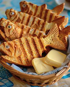 some fish shaped crackers and cheese in a basket