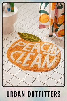 an orange rug with the words peachy clean on it